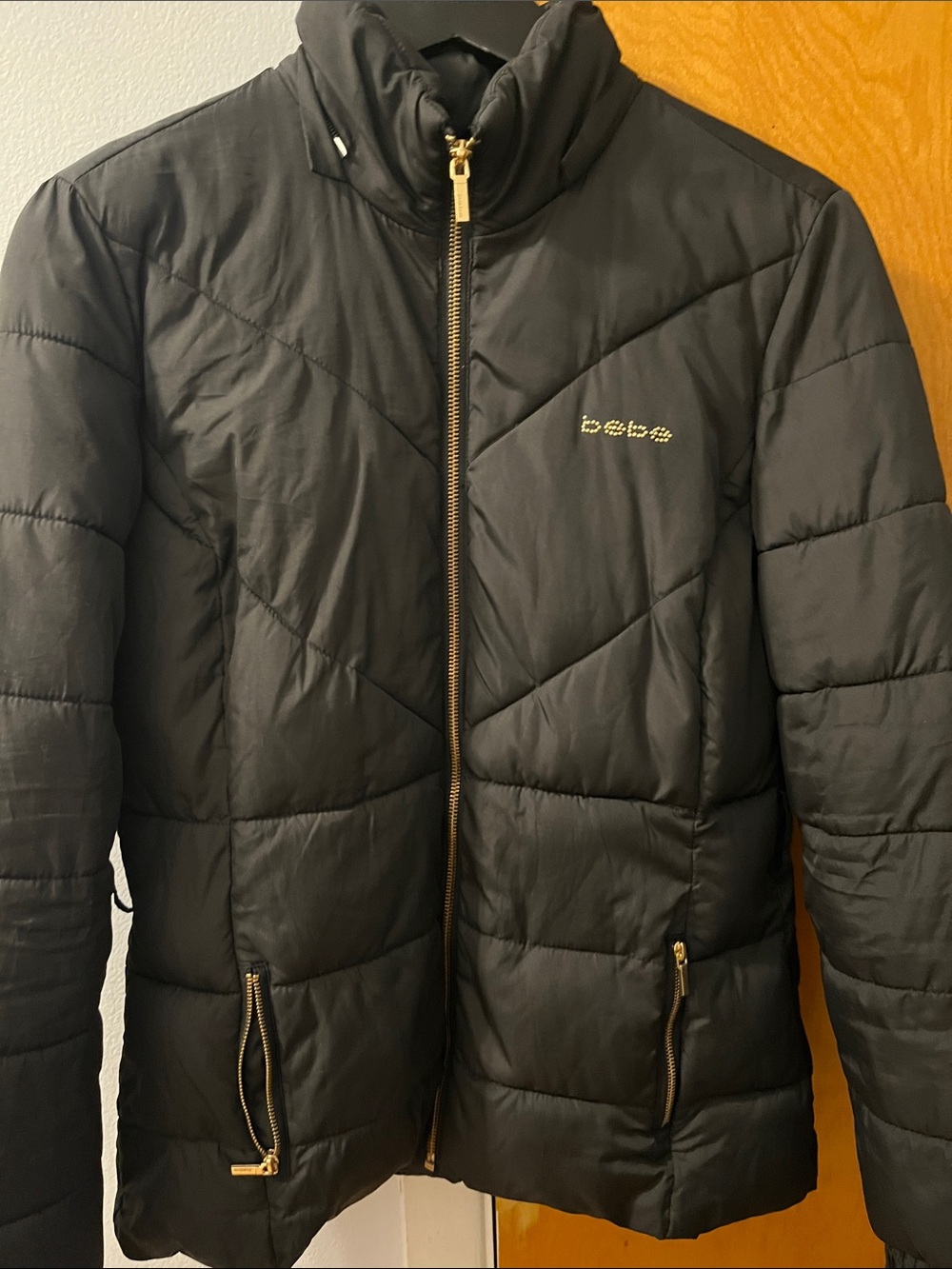 bebe Black Quilted Puffer Jacket with Gold Accents